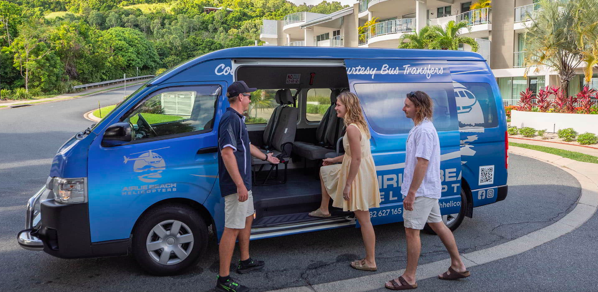 airlie beach helicopters free bus service