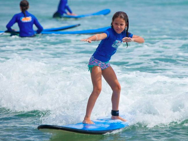 Kids surfing class. Photo credit @gorideawave on Instagram