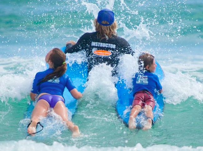 Kids surfing lesson. Photo credit @gorideawave on Instagram