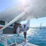 Hop off the Seaplane in GBR. Photo credit @air_whitsunday on Instagram