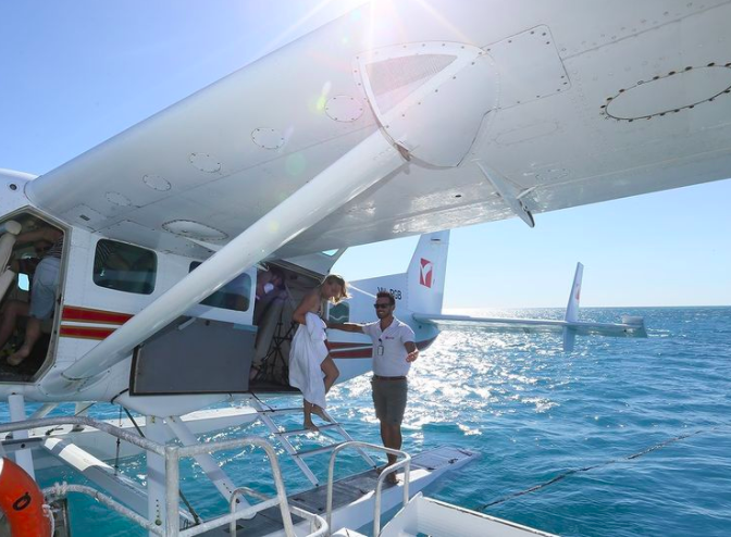 Hop off the Seaplane in GBR. Photo credit @air_whitsunday on Instagram